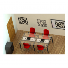 Puesto de trabajo con soportes metálicos y conectividad por medio de canaleta y Grommets
